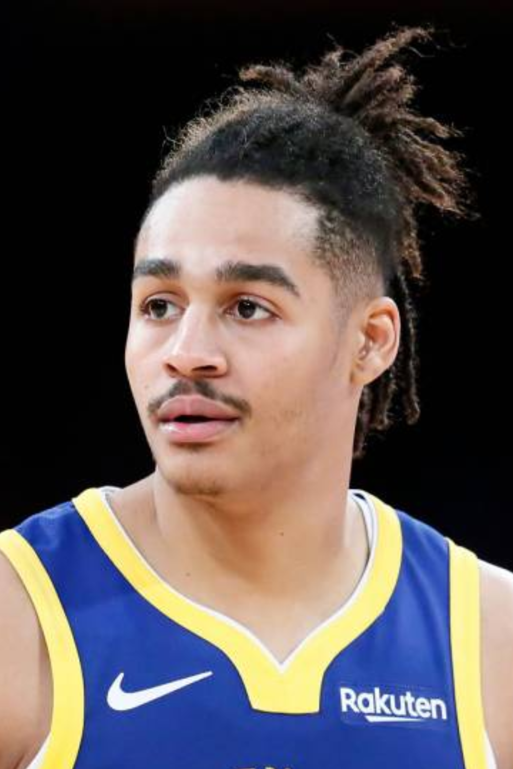 jordan poole in a topknot ponytail
