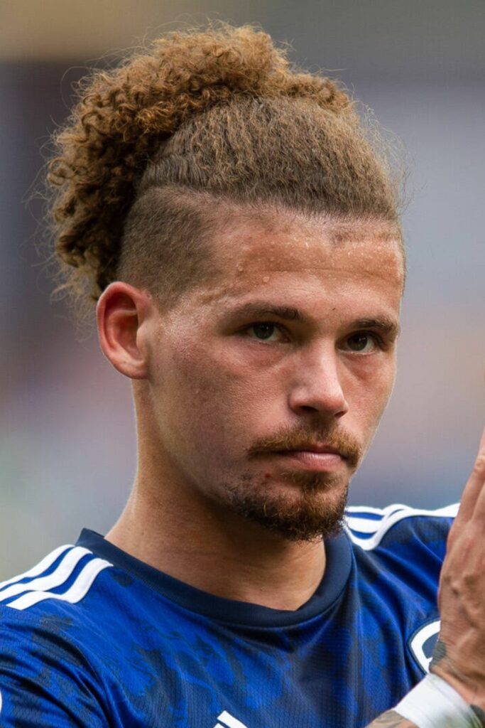 Kalvin Phillips Hair in top knot afro